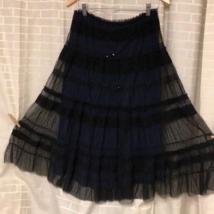 Lace sheer over cobalt blue stretch skirt